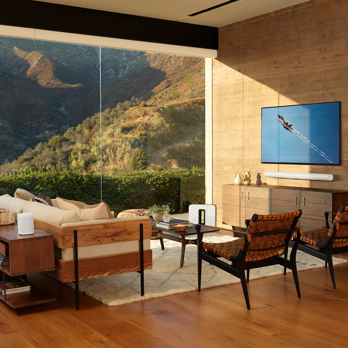 Living room with Sonos Arc soundbar and Sonos subwoofer