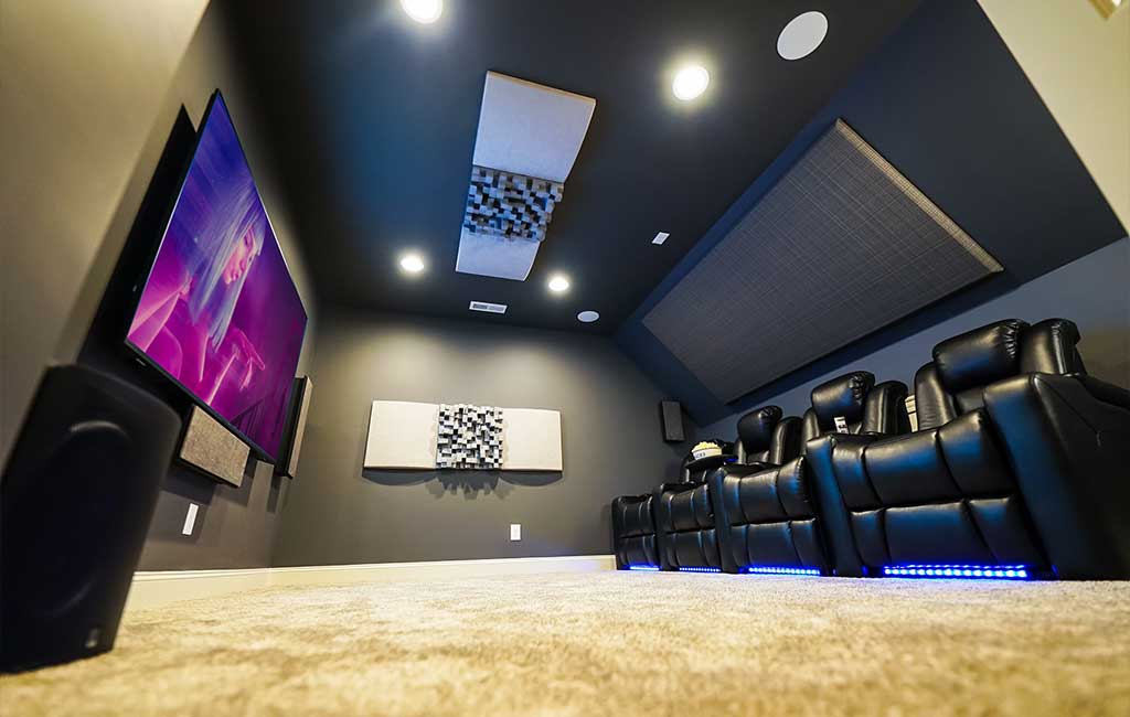 home theater with revolution seating and vicoustic panels